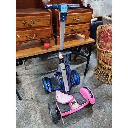 638 - Two iScooter branded Segway's including an adult and child example.