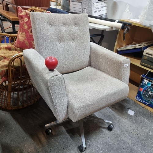 644 - A fabulous Mid Century Modern 1960's swivel chair with metal spider leg base on castors. Upholstered... 