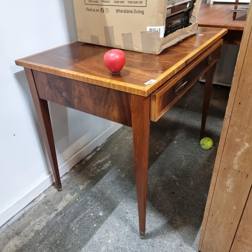 648 - A stylish Edwardian style console table from William Tillman with drawer to front boasting brass dro... 