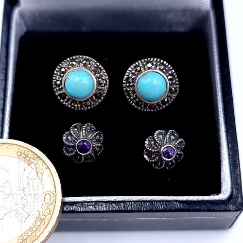 536 - Two pairs of vintage stud earrings consisting of a turquoise stone pair together with an amethyst st... 