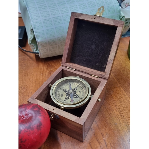 658 - A fine example as a vintage brass marine Gimbal compass, featuring original elements and encased in ... 