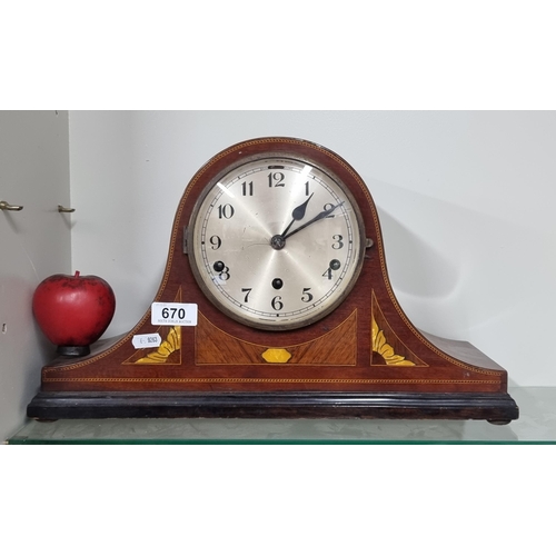 670 - A large striking Edwardian  mantle clock with string inlay detail. A lovely example.