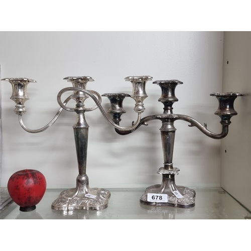 678 - Two elegant silver plate three branch candelabras.