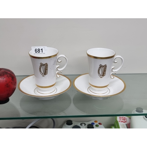 681 - A vintage duo of teacups with saucers c. 1963. Featuring a gilt harp design. In very good condition.