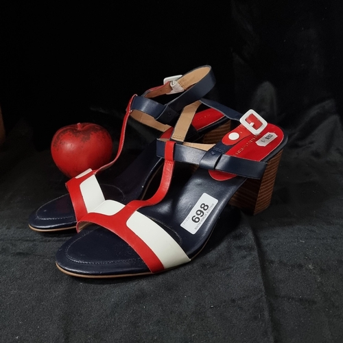 698 - A stylish pair of Tommy Hilfiger genuine leather sandals with wooden effect heels, T-strap and a str... 