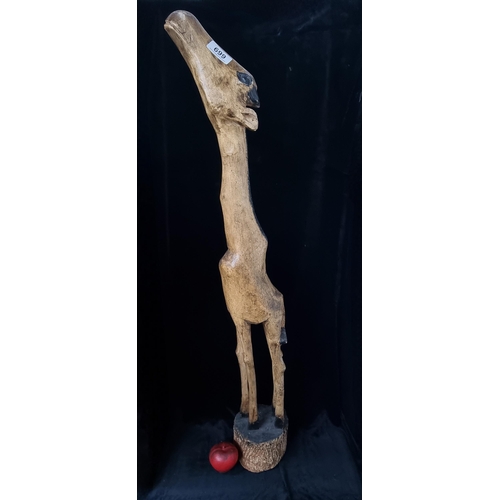 699 - A super sweet tall carved wooden giaraffe. Carved from a single piece of wood.