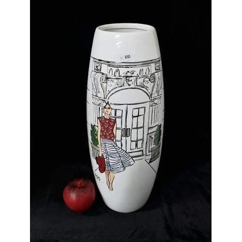 705 - A large Paul Costello designer abstract vase. H40cm. Featuring an image of a Parisian woman.