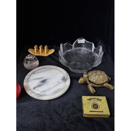 707 - A mixed lot including a charming brass tortoise ashtray with hinged shell, a vintage State Express 5... 