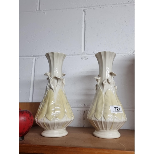 721 - A wonderful pair of Mid Century Belleek vases boasting stunning floral motifs in high relief and sub... 