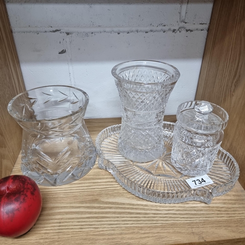 734 - Four crystal items including a Waterford Crystal serving platter, two elegant vases and a lidded pre... 