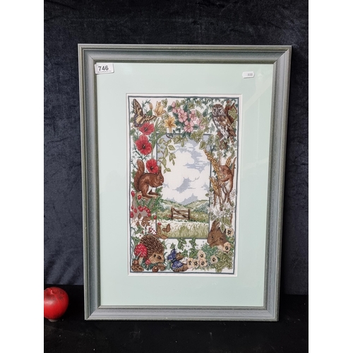 746 - An adorable vintage needlework embroidery featuring charming woodland creatures such as a hedgehog, ... 