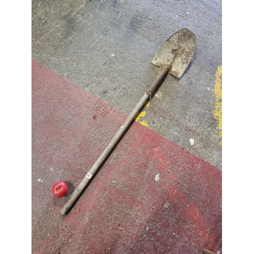 806 - A useful heavy duty garden spade and another garden tool.