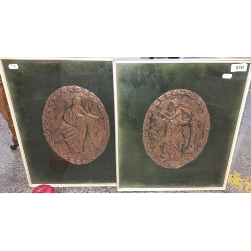 810 - A pair of hammered copper medallions showing Greek Muses with foliate borders. Inscribed Marie botto... 