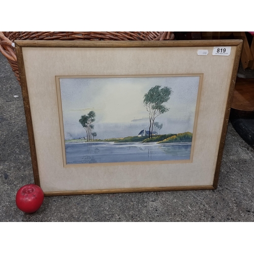 819 - An accomplished original watercolour on paper painting featuring a lakeside scene with blue sky and ... 