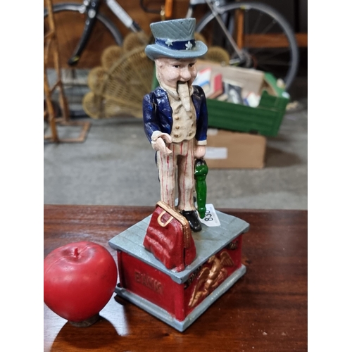 838 - A wonderful cast metal articulated Uncle Sam money box, in a bright hand painted finish.