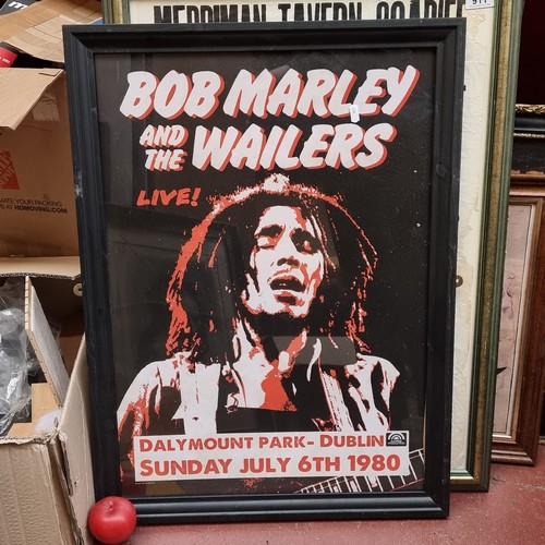 910 - A large print of a framed poster of Bob Marley and The Wailers live in concert at Dalymount Park-Dub... 