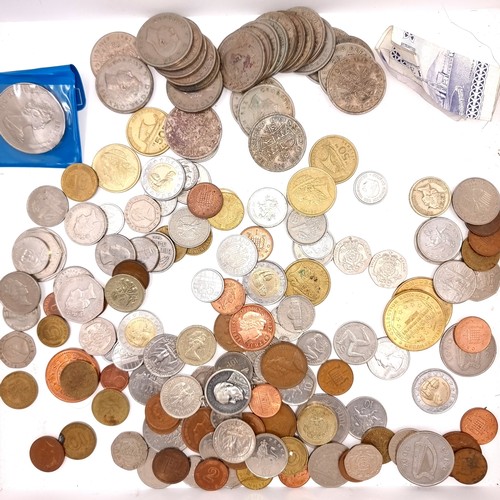 909 - A large assortment of vintage coinage including many British pre decimal and American examples, alon... 