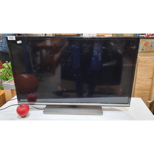 926 - A Panasonic LED TV model TX-32GS352B, sleek design with stand. Ideal for contemporary viewing experi... 