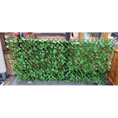 929 - Vibrant faux green leaf trellis, creating a serene and natural ambiance for any space, indoors or ou... 