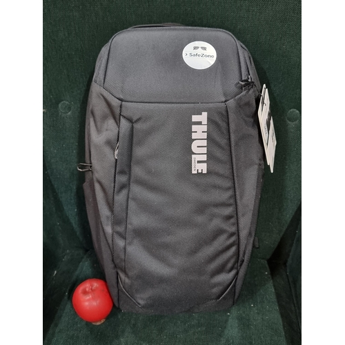 942 - A brand new with tags Thule Sweden 20L backpack featuring SafeZone compartment, ideal for electronic... 