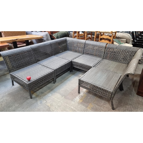 958 - Star Lot : Sleek outdoor sectional sofa with contemporary woven design in charcoal grey. Durable wit... 