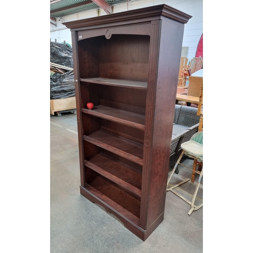 959 - A good wooden bookcase with 4 shelves and traditional crown molding. With a lovely dark finish.  H19... 