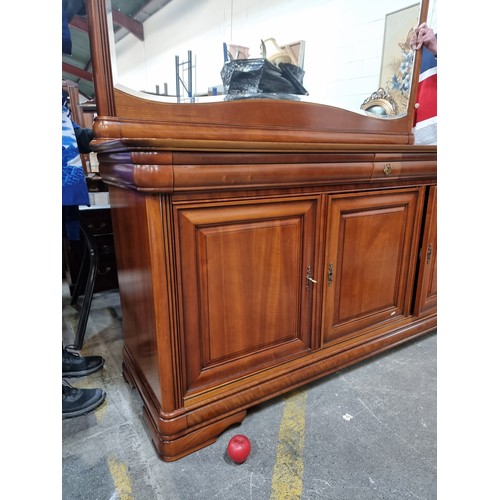 922 - Star Lot : Elegant large Mirrored back  mahogany sideboard with cupboard space featuring a full leng... 