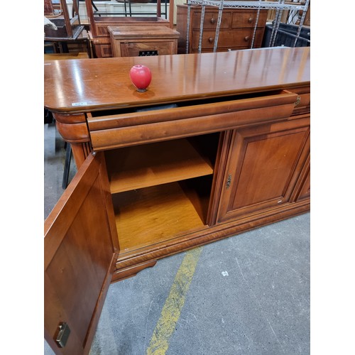 922 - Star Lot : Elegant large Mirrored back  mahogany sideboard with cupboard space featuring a full leng... 