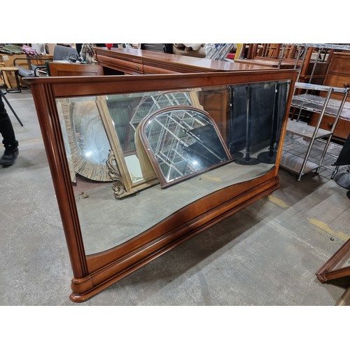 922 - Star Lot : Elegant large Mirrored back  mahogany sideboard with cupboard space featuring a full leng... 