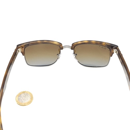 5 - A pair of as new RayBan sunglasses with faux tortoise shell frames, marked made in Italy, comes in o... 