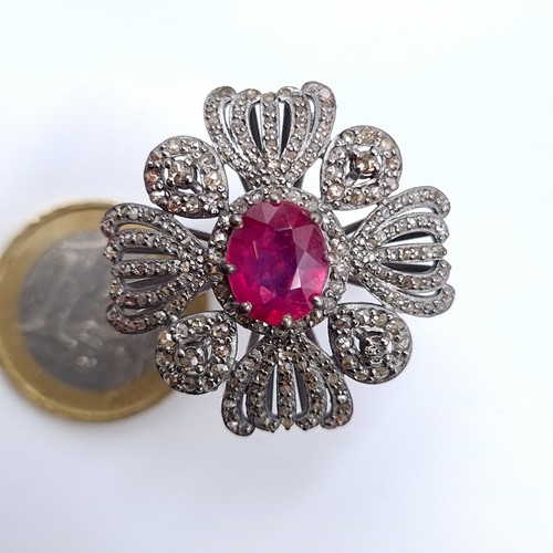 504 - Star Lot : A beautiful ruby ring mounted in ruby surrounded by diamonds, weight of ruby 4.1 cts, dia... 