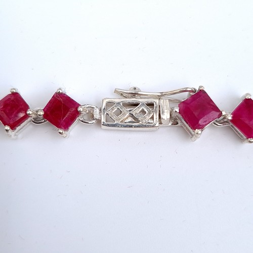 510 - Star Lot : A very nice example of a ruby gemstone necklace with sterling silver clasp, length of nec... 