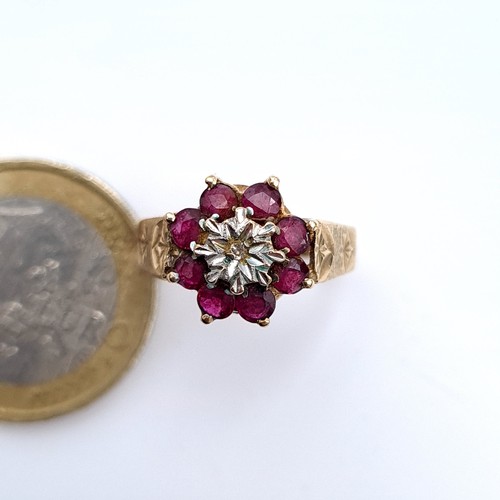 529 - Star Lot : A good quality vintage hallmarked 9K gold vintage diamond and ruby ring, stones set to a ... 