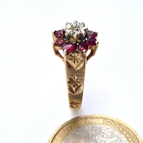 529 - Star Lot : A good quality vintage hallmarked 9K gold vintage diamond and ruby ring, stones set to a ... 