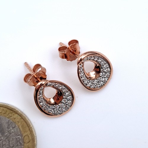 535 - A most attractive suite of rose gold toned jewellery consisting of a drop pendant with gem stone acc... 