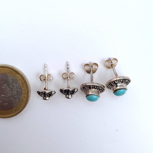 536 - Two pairs of vintage stud earrings consisting of a turquoise stone pair together with an amethyst st... 