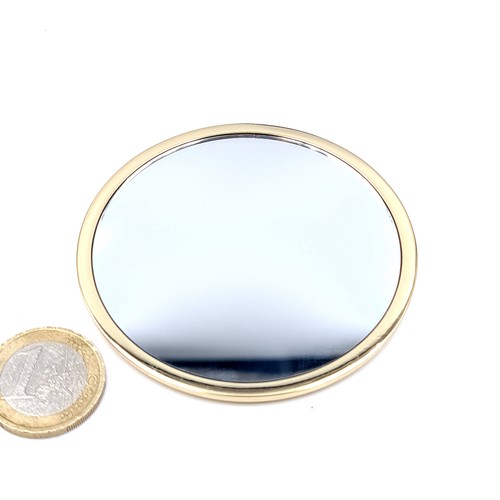 546 - A pretty vanity mirror by Bvlgari, the back with a fine gold machine cut finish, also marked Bvlgari... 