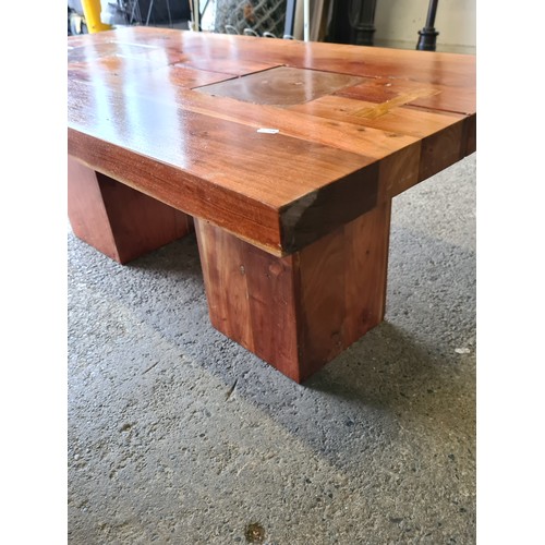 797 - Star Lot : An unusual and very stylish coffee table featuring a solid wood top boasting attractive j... 