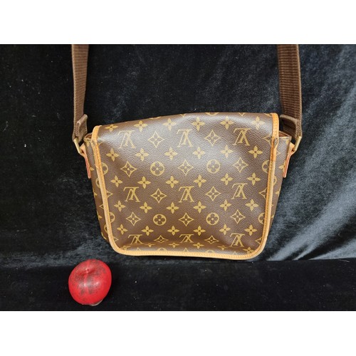 151 - Star Lot: A magnificent designer Louis Vuitton brown canvas bosphore shoulder bag featuring the mono... 