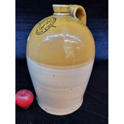 444 - A rare large early 20th century 2 gallon crock from Alex Finlater Dublin. In good condition.