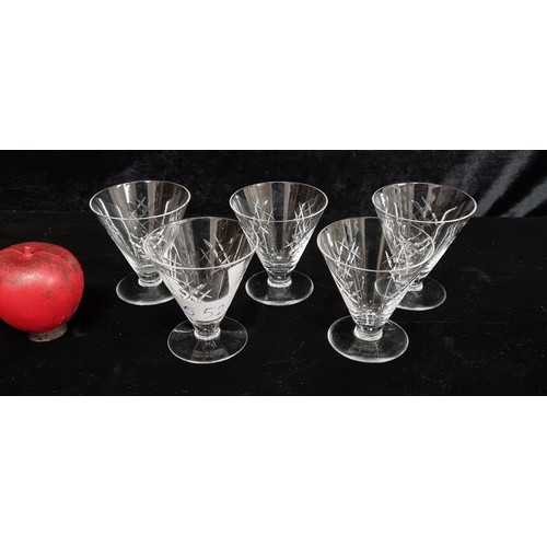 552 - A set of 5 unusual Waterford Crystal footed glasses with a geometric design. Great condition aside f... 