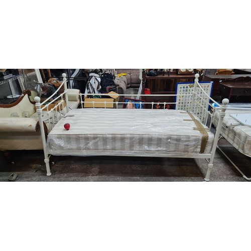 911 - Star Lot : A charming French style single bed frame with high metal frame featuring ornate detailing... 