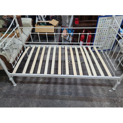 911 - Star Lot : A charming French style single bed frame with high metal frame featuring ornate detailing... 