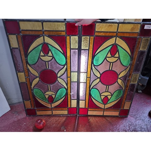 114 - Two mesmerising pieces of stained glass, featuring an Art Nouveau style organic motif to centre in s... 