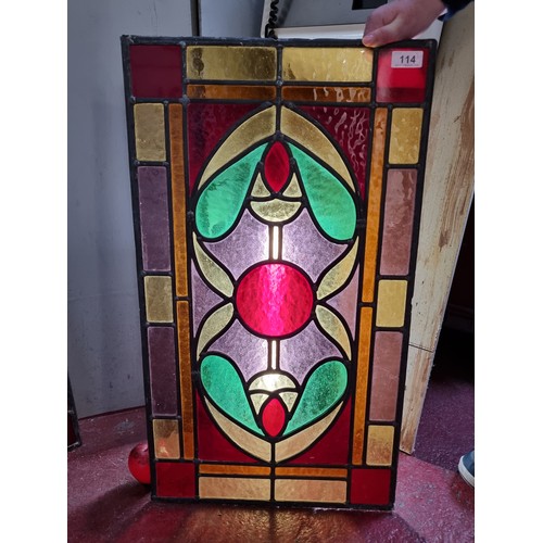 114 - Two mesmerising pieces of stained glass, featuring an Art Nouveau style organic motif to centre in s... 