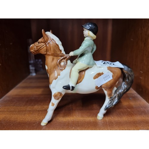 262 - A rare vintage Beswick ceramic figure of a rider on a horse. In very good condition. Similar on Ebay... 