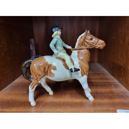 262 - A rare vintage Beswick ceramic figure of a rider on a horse. In very good condition. Similar on Ebay... 