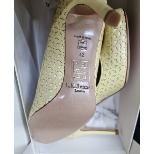 695 - A striking pair of new unworn genuine leather L.K. Bennett London 'Cannes' heels in a lemon yellow f... 