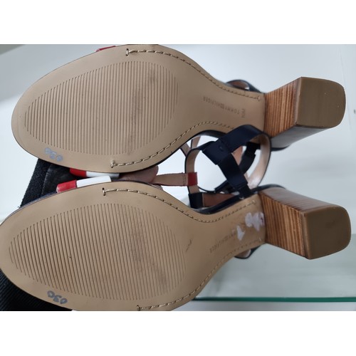 698 - A stylish pair of Tommy Hilfiger genuine leather sandals with wooden effect heels, T-strap and a str... 