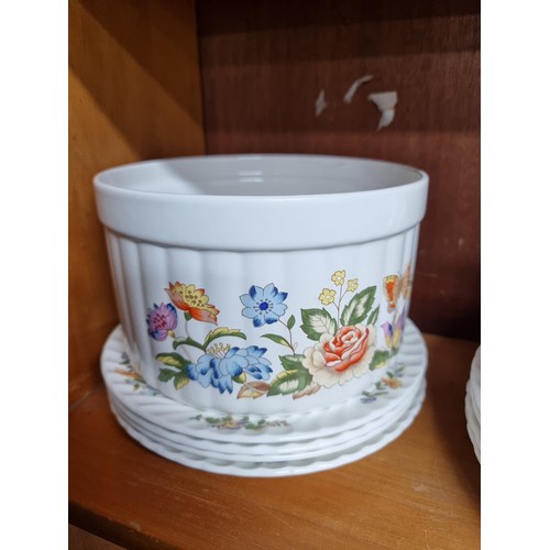 723 - A large collection of Aynsley fine bone china in the Cottage Garden pattern including soup bowls, tu... 